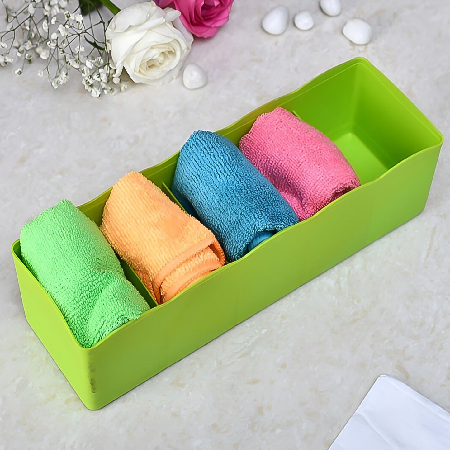 Drawer organizers with multiple compartments, ideal for socks and small items.