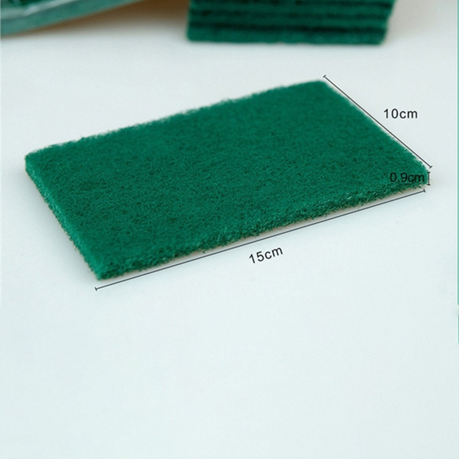 Close-up of aqua green scrub sponges, 10 pieces.