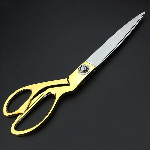 High-end gold-plated scissors for professional use.