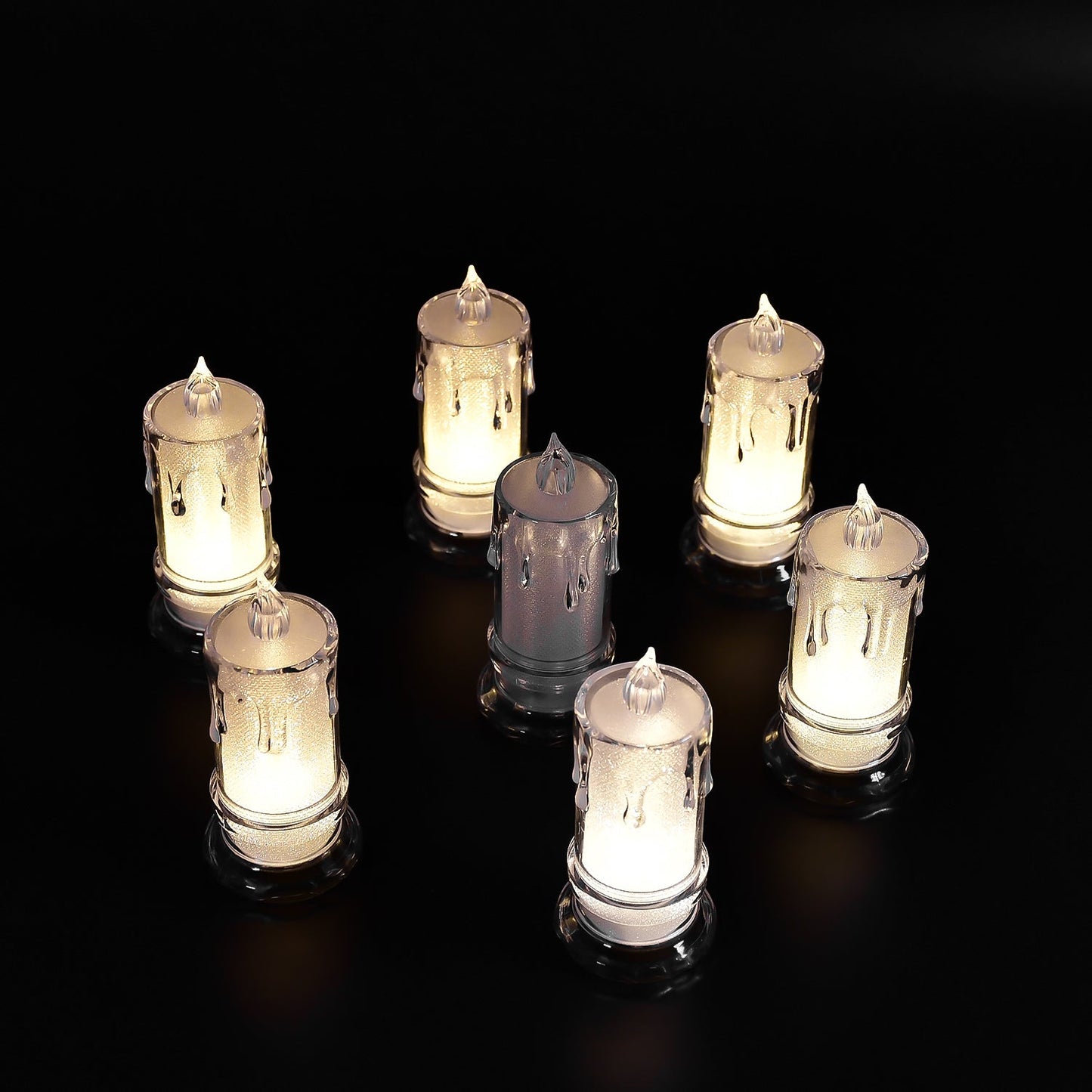 Large flameless candles with a melted design.