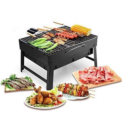 Black charcoal grill oven with cooking surface