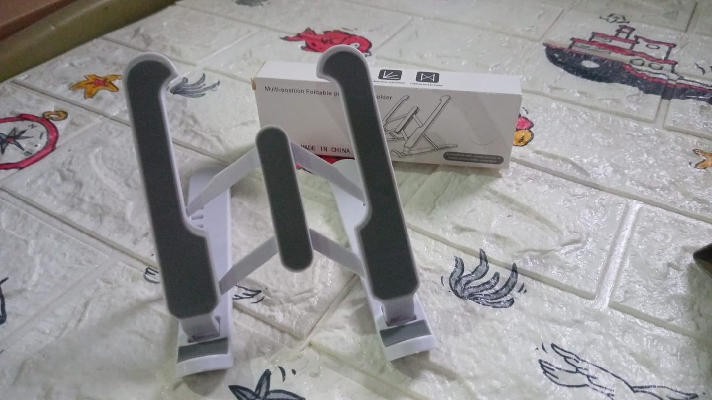 Adjustable stand for tablets with foldable legs