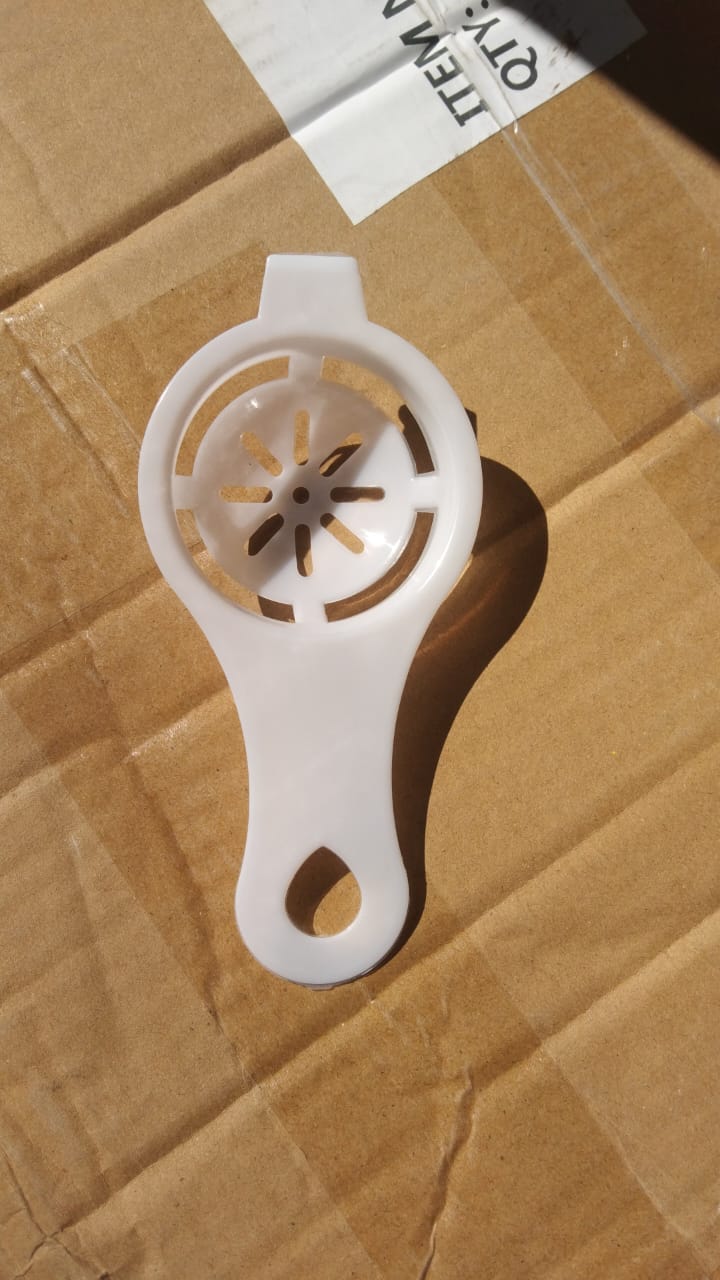 Egg separator tool for efficient yolk and white separation.